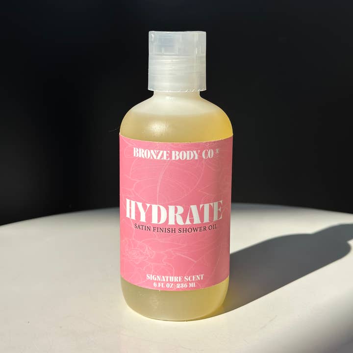 HYDRATE Shower + Body Oil for wholesale by Bronze Body® Collection