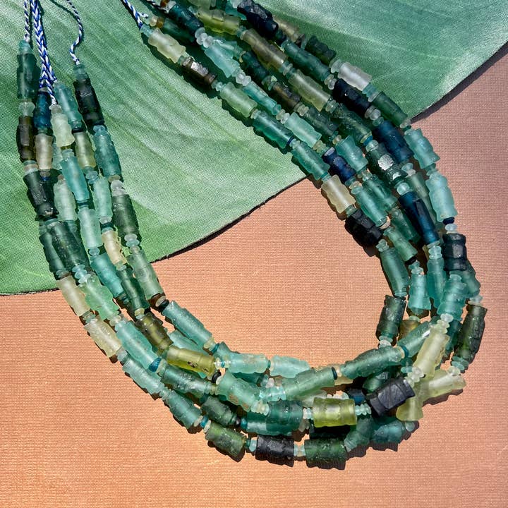 Silk Road Roman Glass Carved Bead Strand for wholesale by Bead Goes On