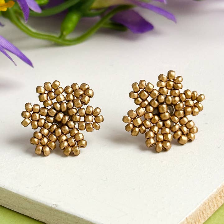 Gyldne Snefnugindlæg for engroshandel hos WorldFinds