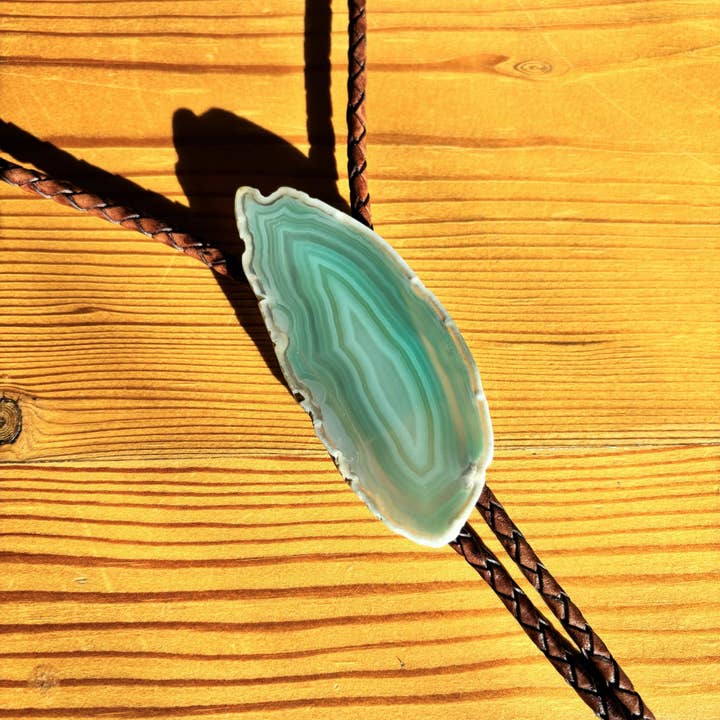 mahogany cord pewter tips Sage Bolo Tie for wholesale on Faire