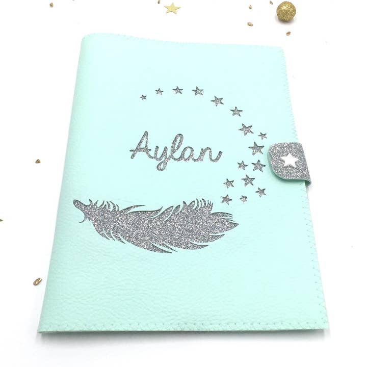 Funda para cartilla sanitaria plumas y estrellas menta en símil piel para venta al por mayor de Crapaud Chou
