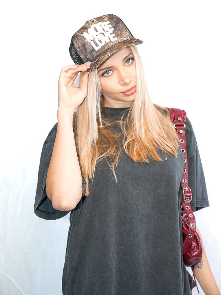More Love Trucker Hat | Mossy Oak for wholesale by Ruben Rojas Live Through Love