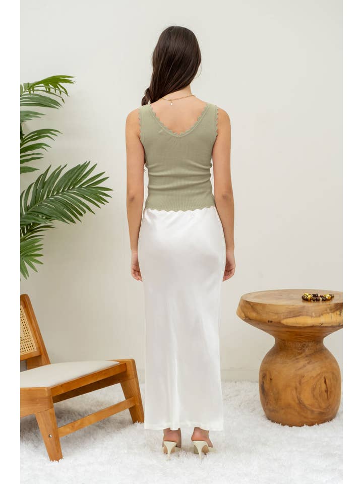 The Workshop Studio – wholesale Stickad topp - Dam – ÄRMLÖS TRÖJA MED KAMMUSSLINGSKANT STICKAD CROP TOP62