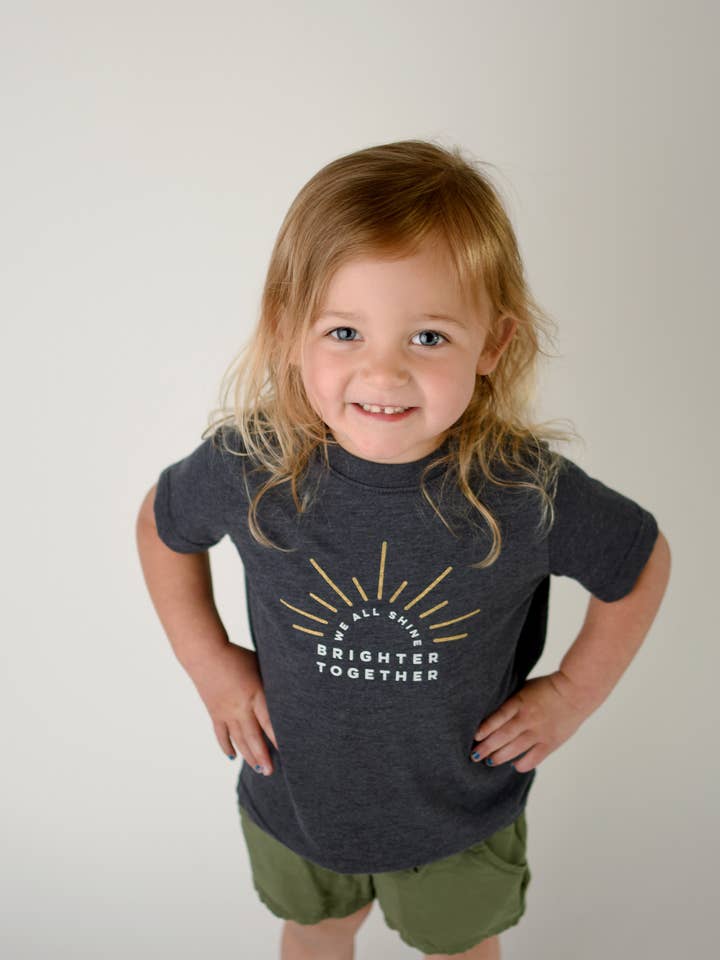 Vintage Navy We All Shine Brighter Together Kids' Tee for wholesale on Faire0