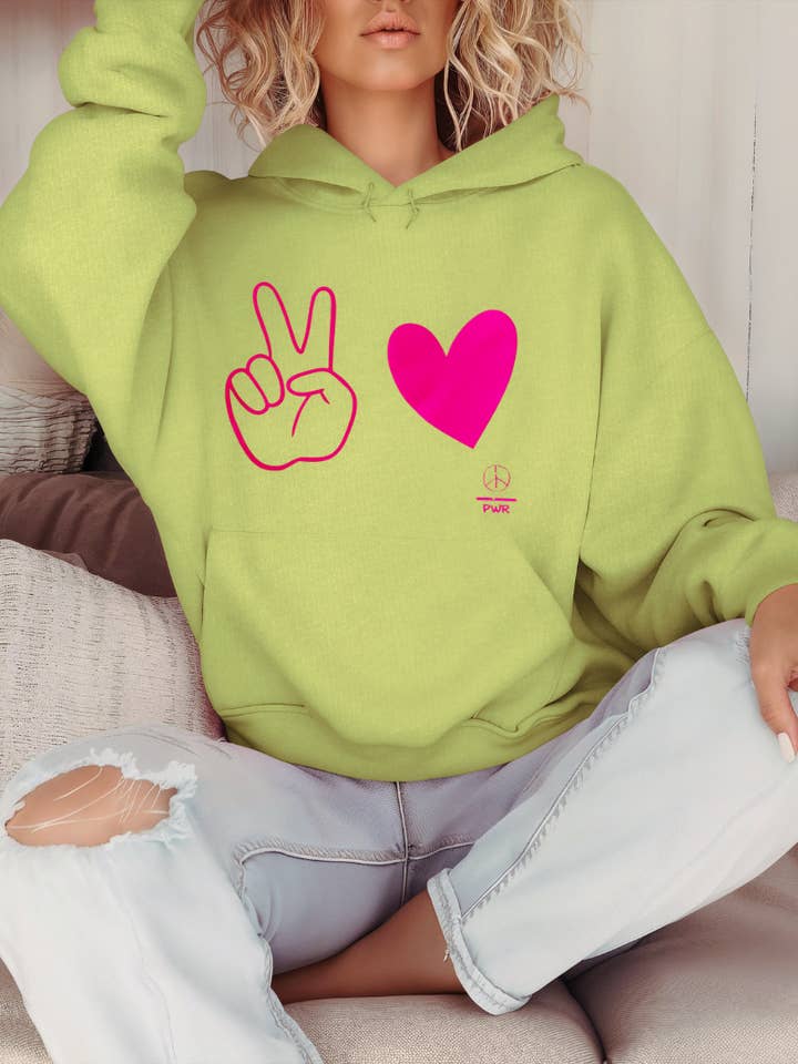 Peace & Love Hoodie – Lime Green Pullover with Neon Pink Peace Sign & Heart Graphic for wholesale by The Maximalist Boutique