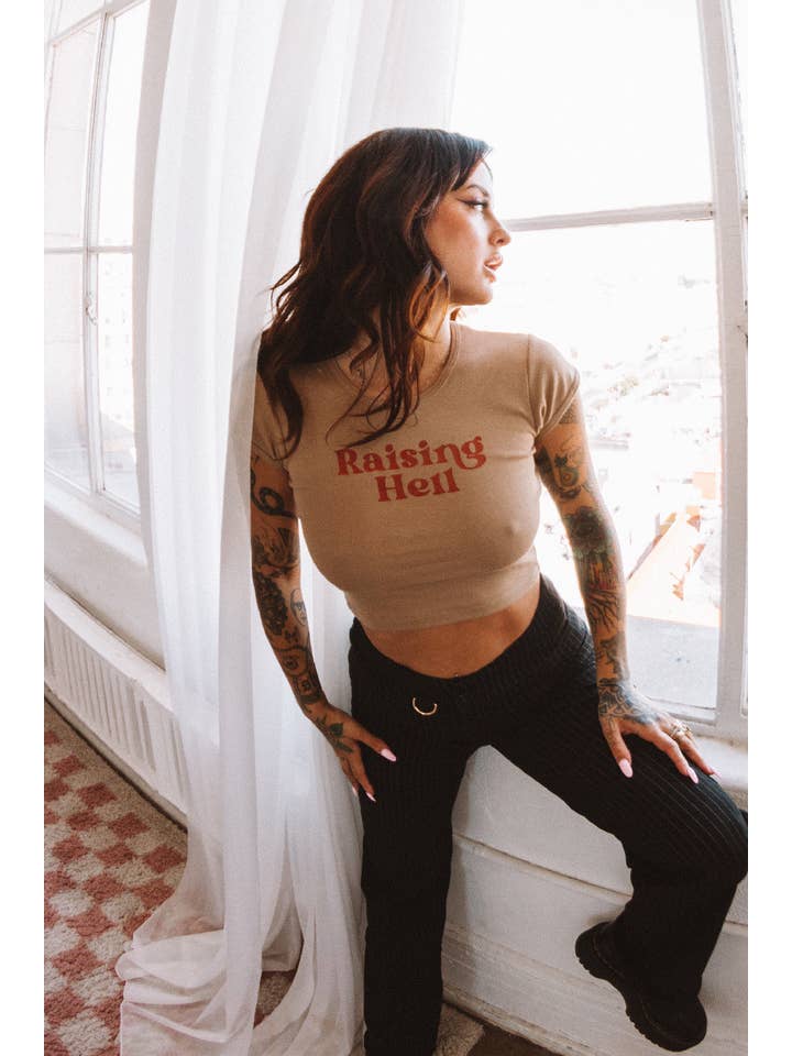 Tan Raising Hell 90's Baby Crop Tee for wholesale on Faire3