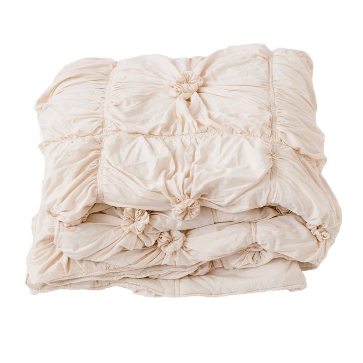 Rosette quilt in Natural *organic cotton and other Purchase Wholesale king. Free Returns & Net 60 Terms on Faire trending on Faire.