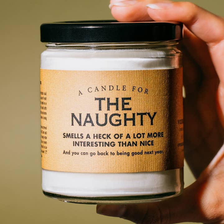 A Candle for The Naughty | Funny Christmas Holiday Candle for wholesale by Whiskey River Soap Co.
