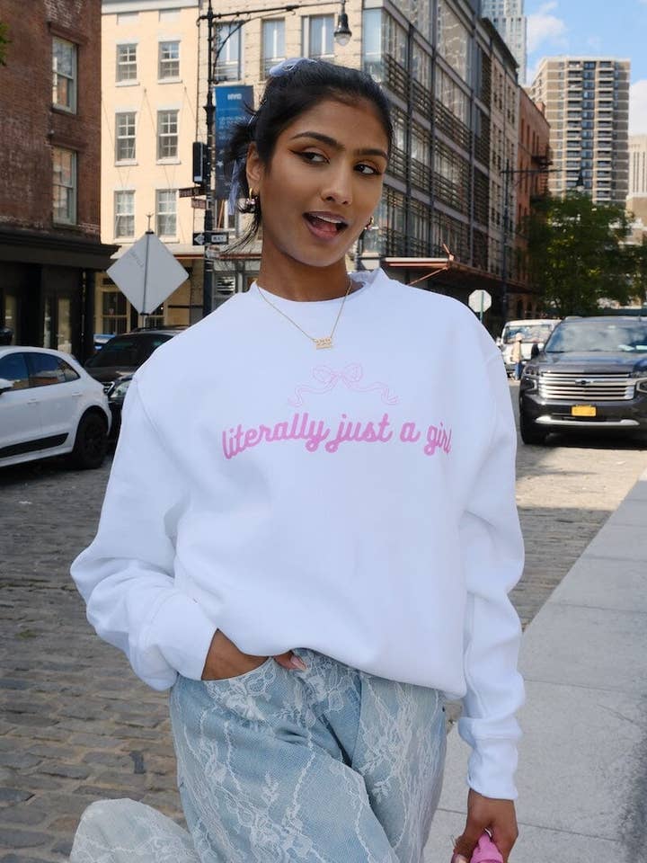 White Literally Just A Girl Graphic Sweatshirt for wholesale on Faire