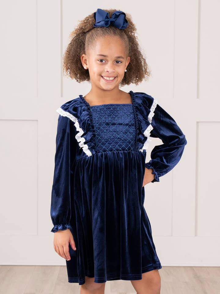 Sapphire Velvet Ruffle Dress for wholesale by Marie Nicole Clothing
