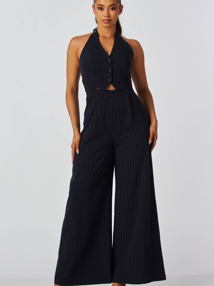 DM4489 STRIPED SLEEVELESS HALTHER JUMPSUIT and other Purchase Wholesale striped jumpsuit. Free Returns & Net 60 Terms on Faire trending on Faire.