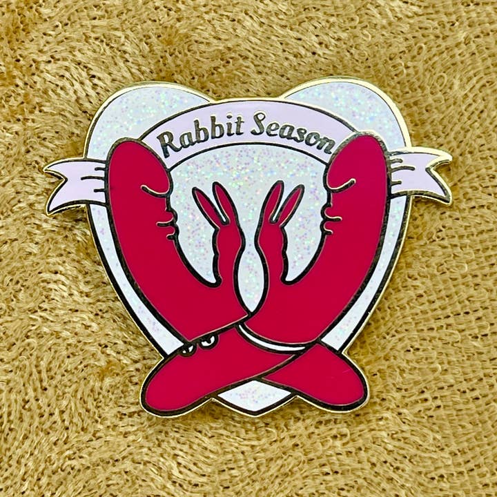 Rabbit Season Enamel Pin for wholesale by Space Babes Art
