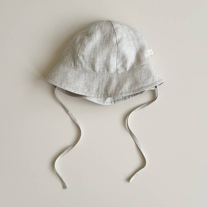 SONNENHUT AUS LEINEN SAVANNA | NATUR, GRÖSSE: 6M-3Y für den Großhandel von Babymood AS