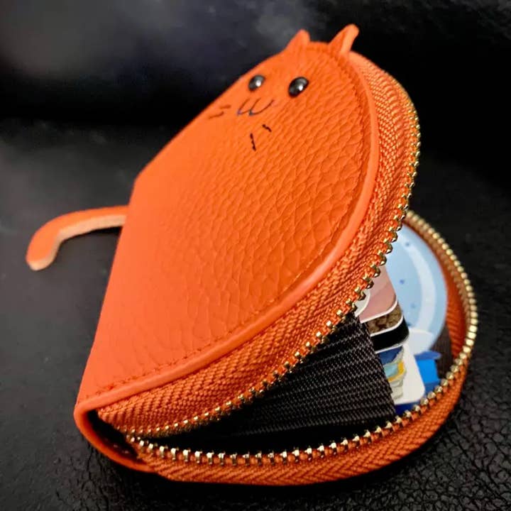 LEATHER FELINE WALLET and other Purchase Wholesale feline. Free Returns & Net 60 Terms on Faire trending on Faire.