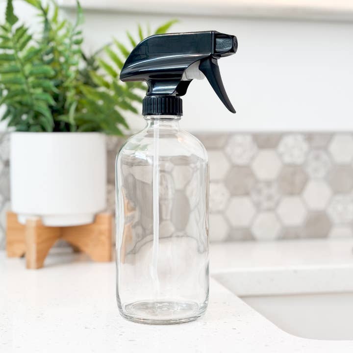 16oz Empty Clear Glass Spray Bottle for wholesale by Matrix Aromatherapy