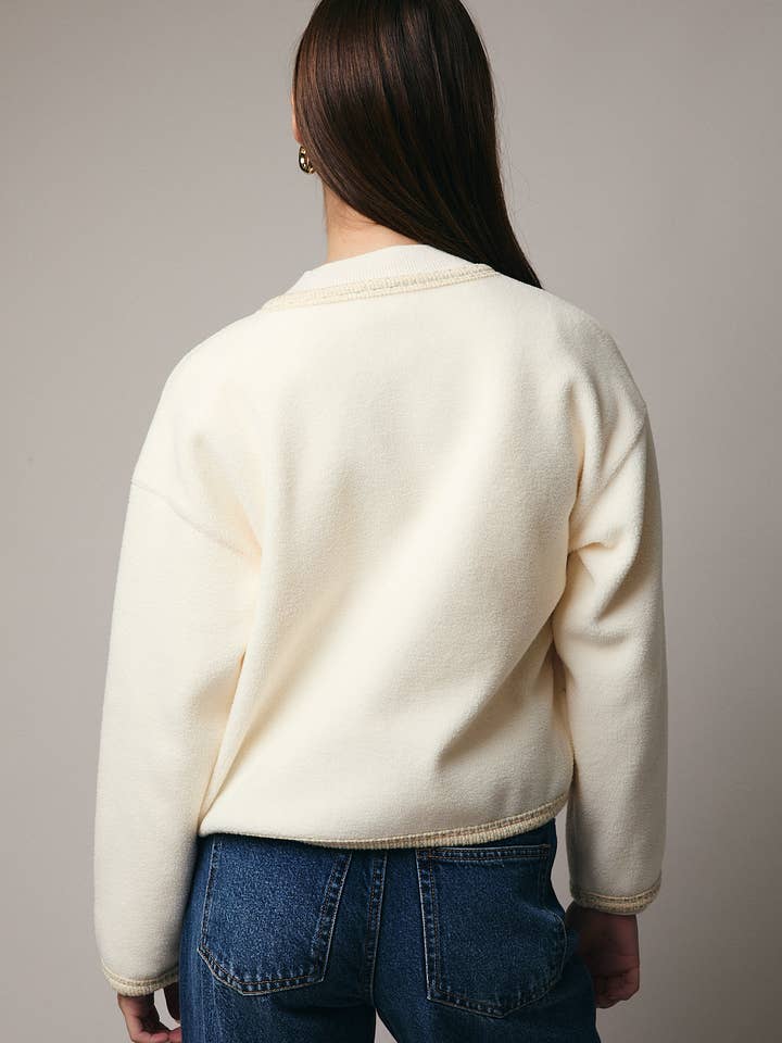 CREAM ROUND NECK BUTTON DOWN FLEECE CARDIGAN for wholesale on Faire3