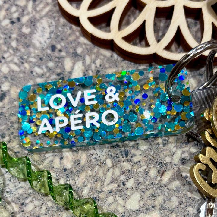 LOVE & APÉRO Llavero con purpurina Más Love para venta al por mayor de Plus de Love