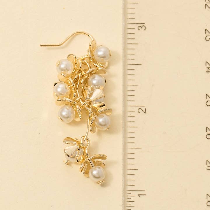 G Pearl Flower Cluster Chain Dangle Earrings for wholesale on Faire2