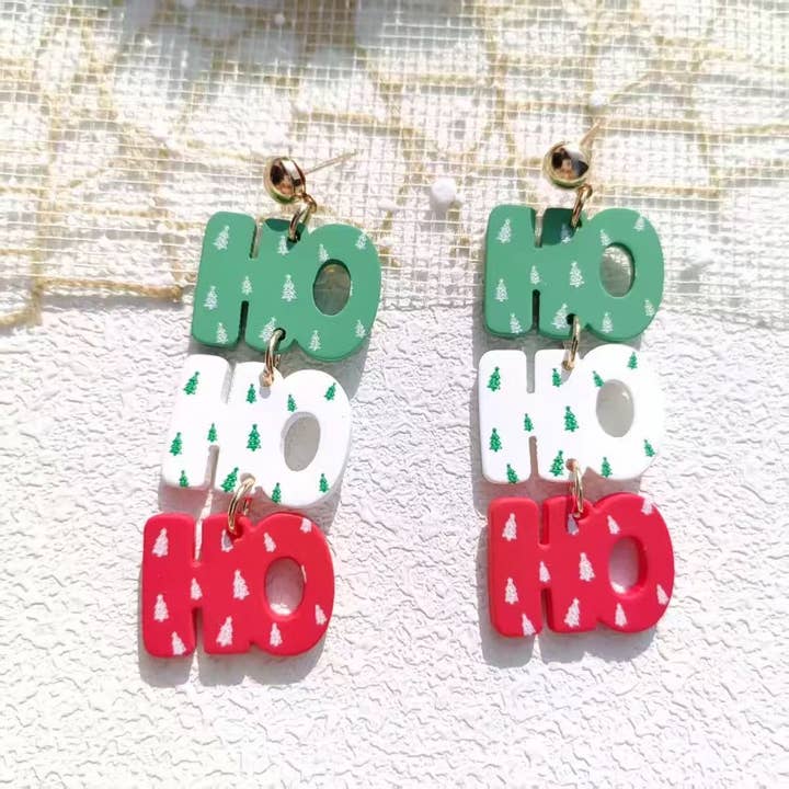 Cute Pair of Drop and Dangle Ho Ho Ho Earrings for Christmas for wholesale by Purple Myrtle