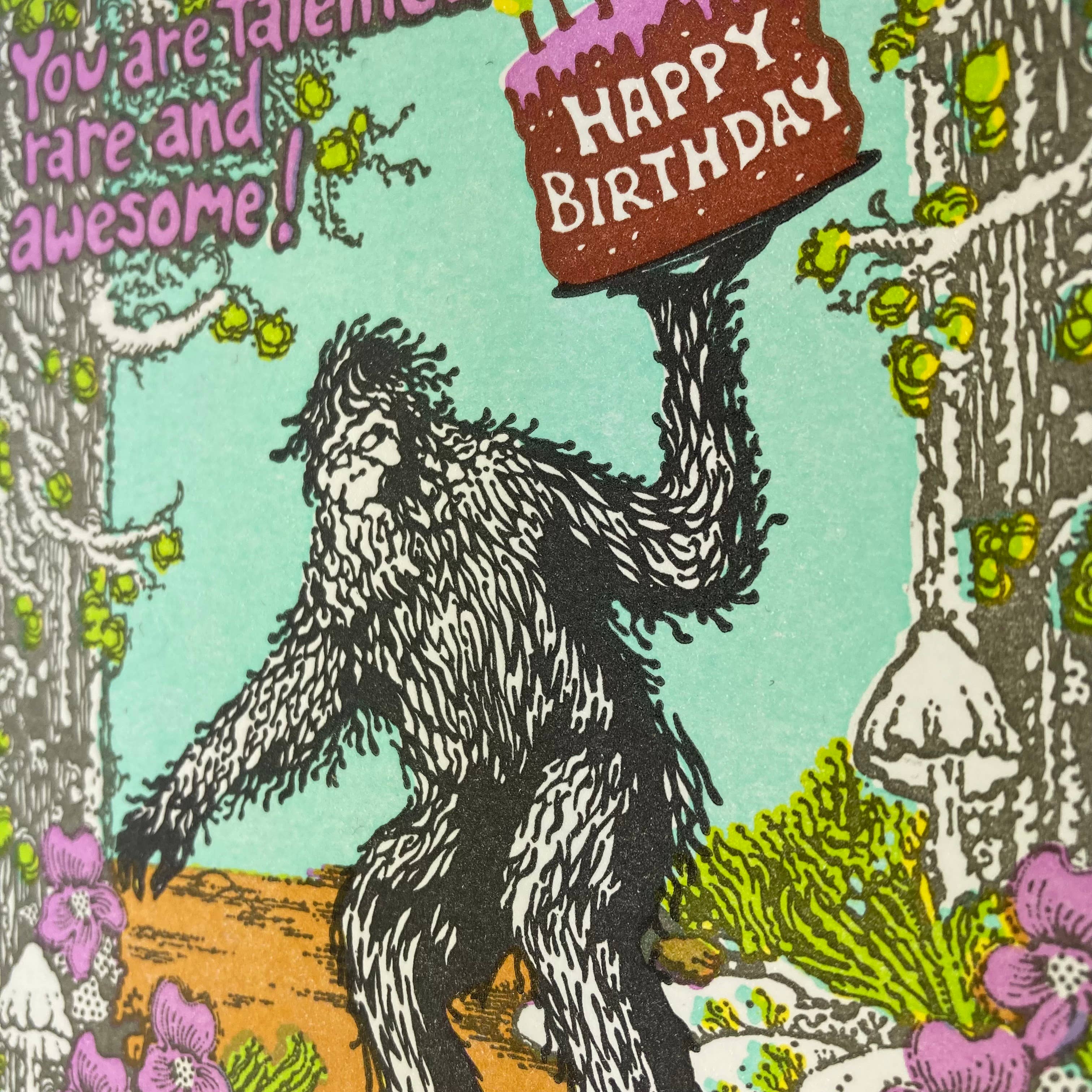 Old School Stationers - Wholesale Birthday Card - Happy Birthday Sasquatch riding a one wheel2