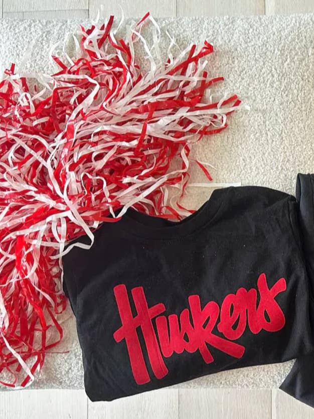 h.flynn - Wholesale T-Shirt - Women's - HUSKERS - BLACK COMFORT COLORS TEE1