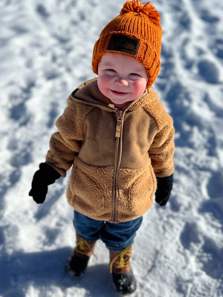 Montana Pom-Pom-Mütze für Kleinkinder, rostorange für den Großhandel von Montana Tees