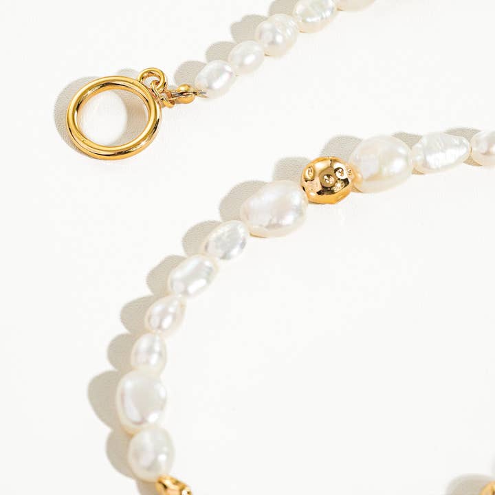 Penelope 18K Gold Natural Baroque Pearl Choker for wholesale on Faire2