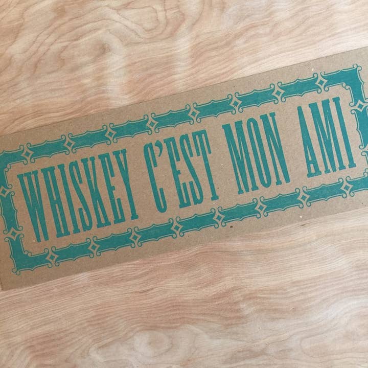Whiskey C'est Mon Ami Cajun French Letterpress Paper Sign for wholesale by Pioneer House (formerly Yee-Haw)