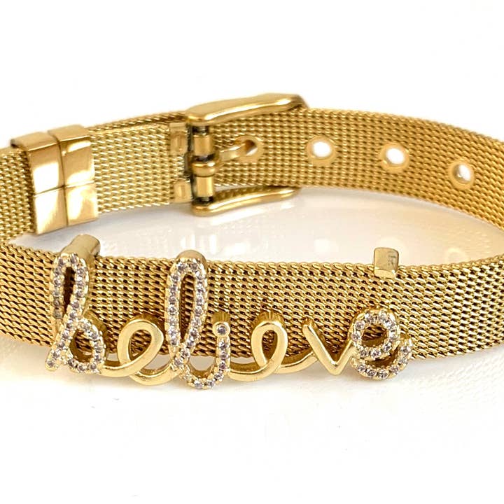 Gold Believe Slider Charm on a Gold Adjustable Bracelet for wholesale by Rebecca Cherry Jewelry Co.