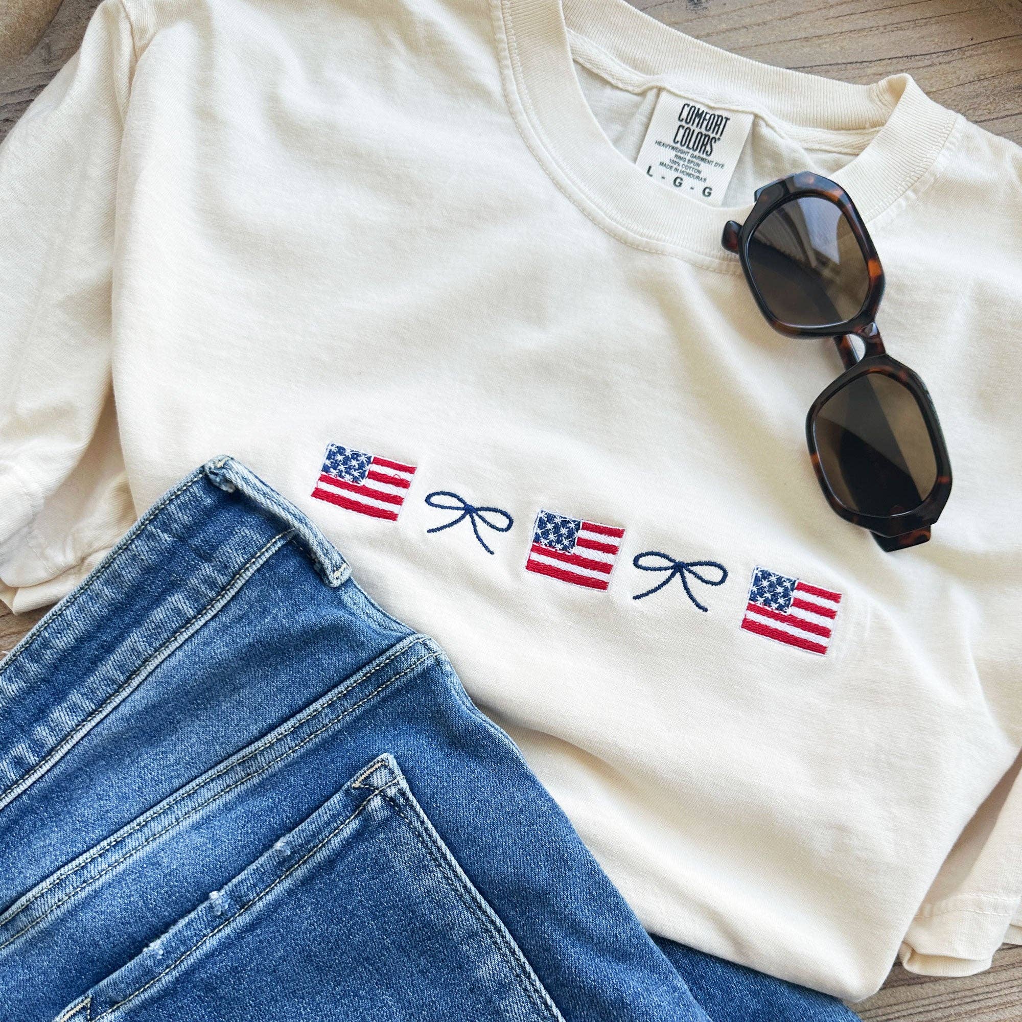 Arden & Gold - Wholesale T-Shirt - Women's - American Flag and Dainty Bow Embroidered Comfort Colors T-Shirt7