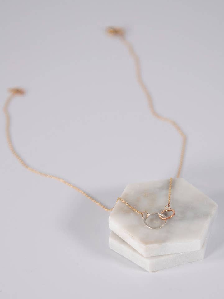 Tiny Unity Necklace - Gold for wholesale by Lonewolf Collective