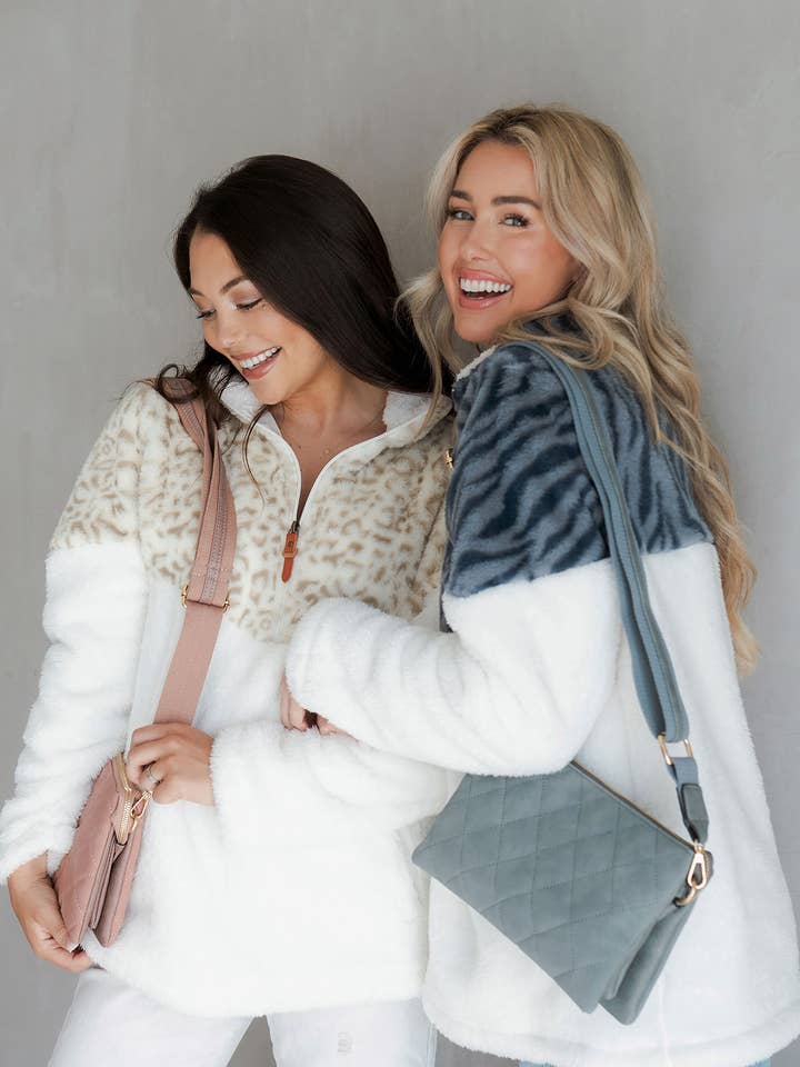 M2056QLT Izzy Quilted Crossbody w/ Guitar Strap for wholesale by Jen & Co.