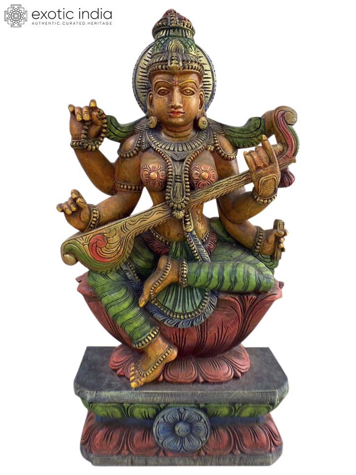 24" Wood Idol Of Goddess Saraswati for wholesale by Exotic India Art