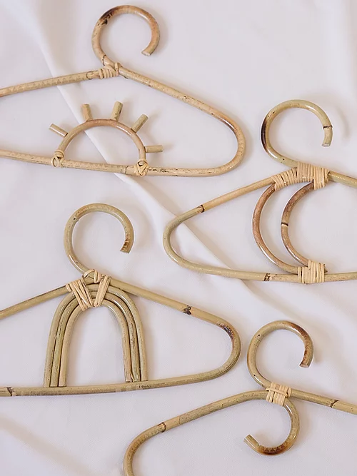 Tan Rainbow Bamboo Kids Hanger for wholesale on Faire2