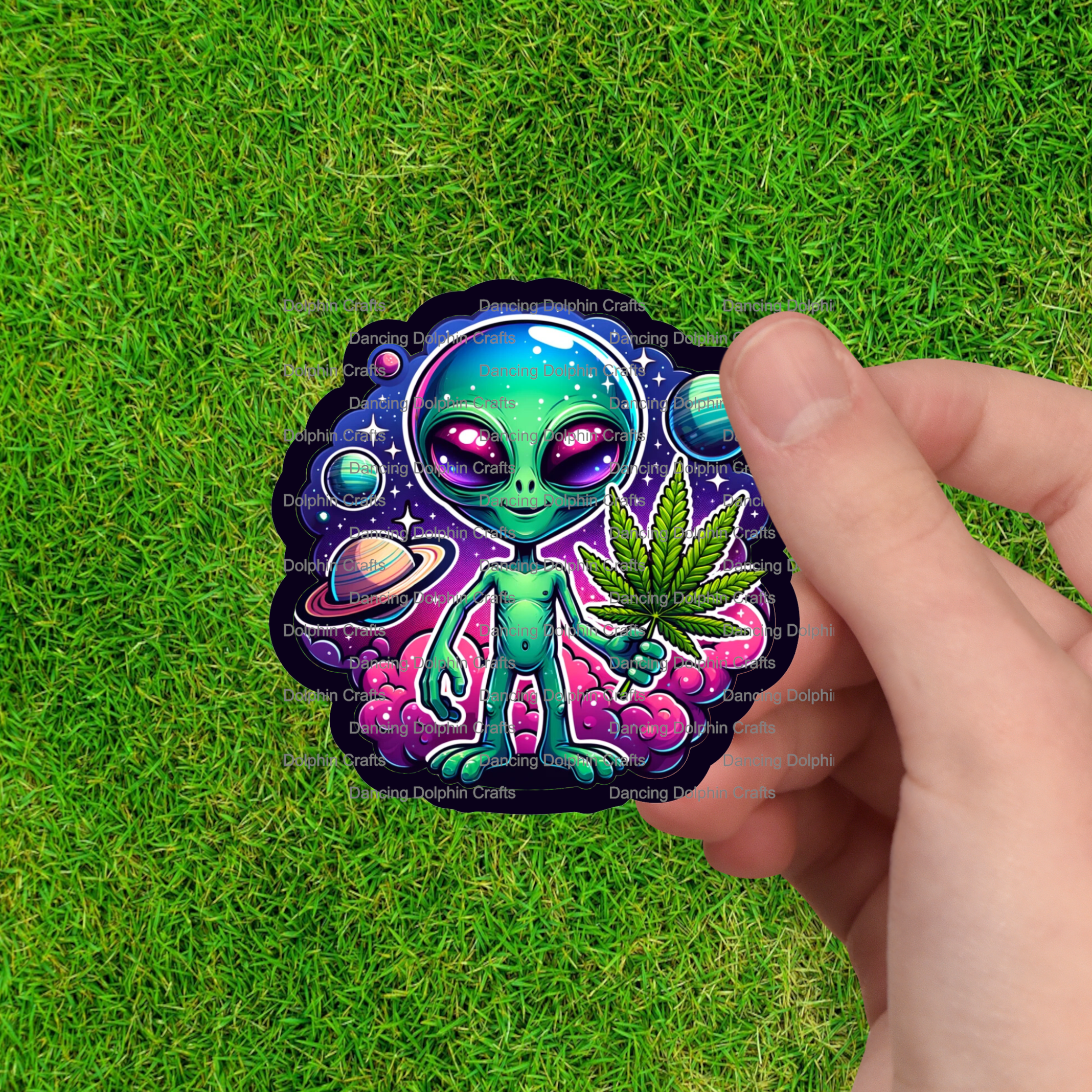 Dancing Dolphin Crafts - Wholesale Sticker - Galactic Green: Cosmic Cannabis Enthusiast Vinyl Sticker0