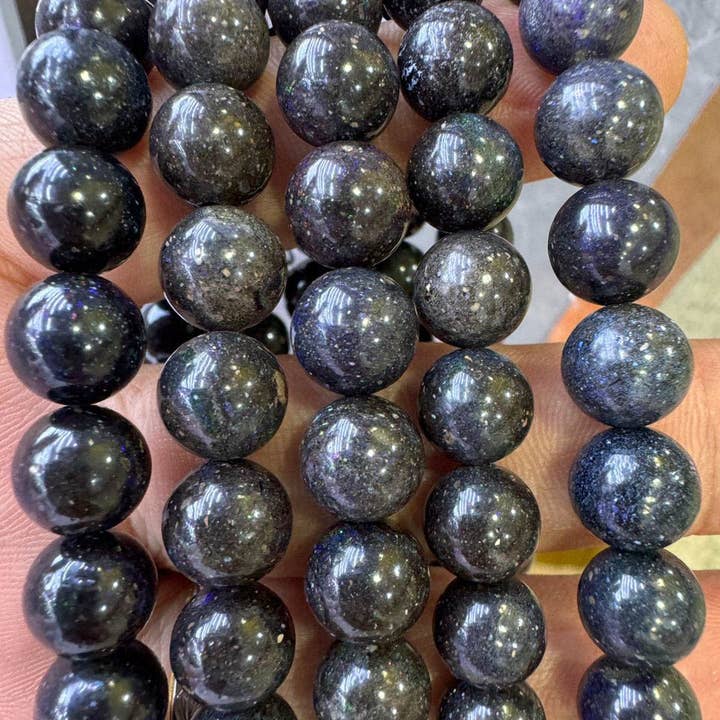 Australische schwarze Opalperlen einzeln verkauft für den Großhandel von Artisans de Madagascar