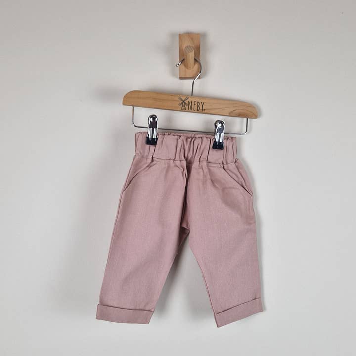 Vente d'échantillons - Pantalon chino élastiqué rose pour enfants pour la vente par Aneby