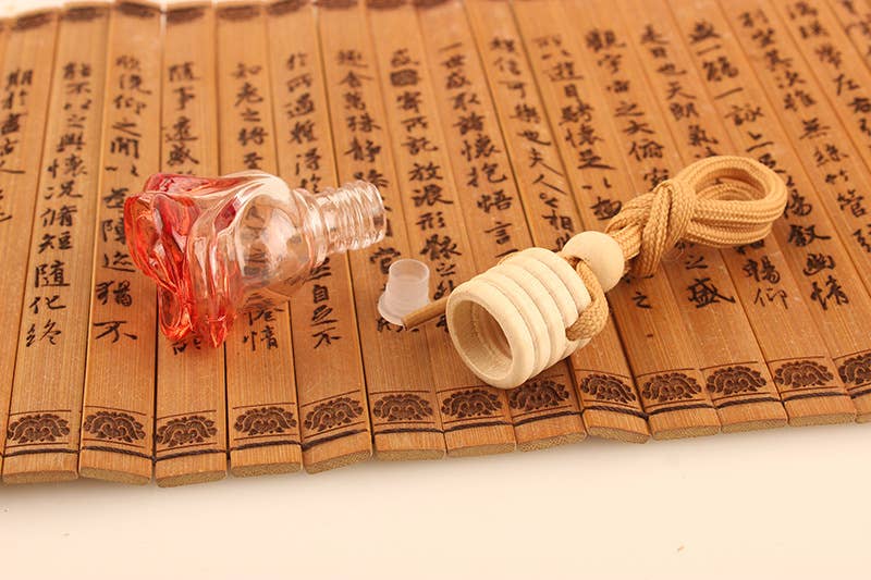 Candles Meta – Ambientador para carro – Unissexo por atacado – Purificador de ar colorido em forma de rosa para carro pendurado em garrafa vazia2