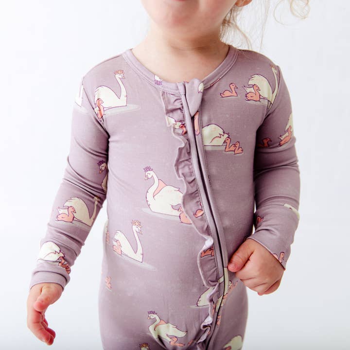 Dreamiere – wholesale Bodysuit (footed) – Baby – Swan Of A Kind Ruffle Convertible Footie1