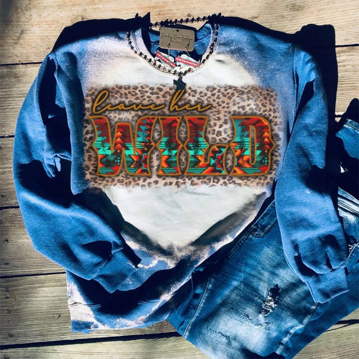 Leave her Wild Sweatshirt for wholesale by Ranchy Roan Boutique