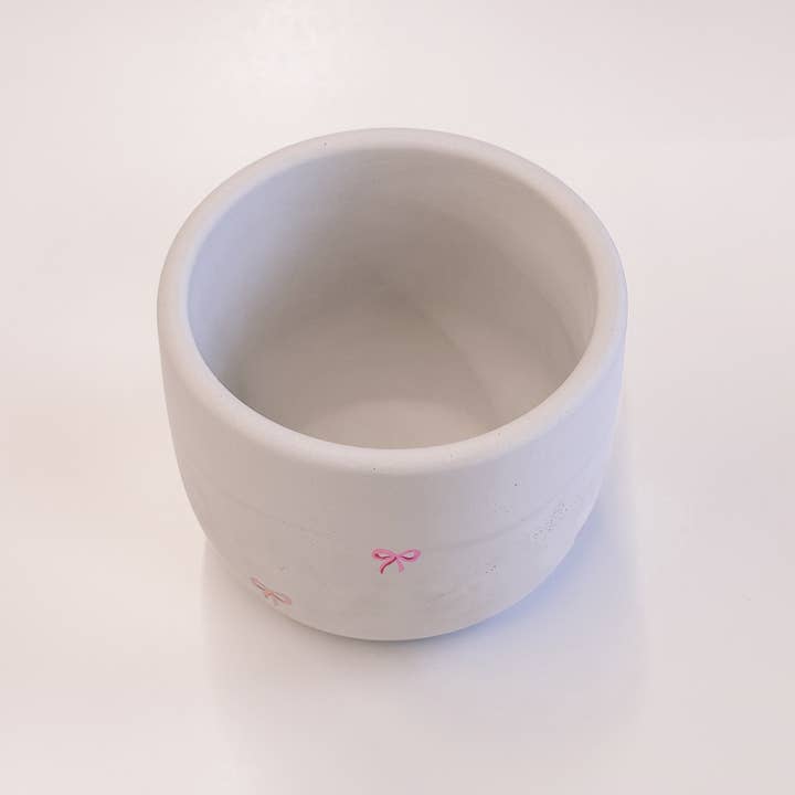 The Plant Supply - Wholesale Plant Pot - Pink Bow Concrete Planter With Drainage Hole1