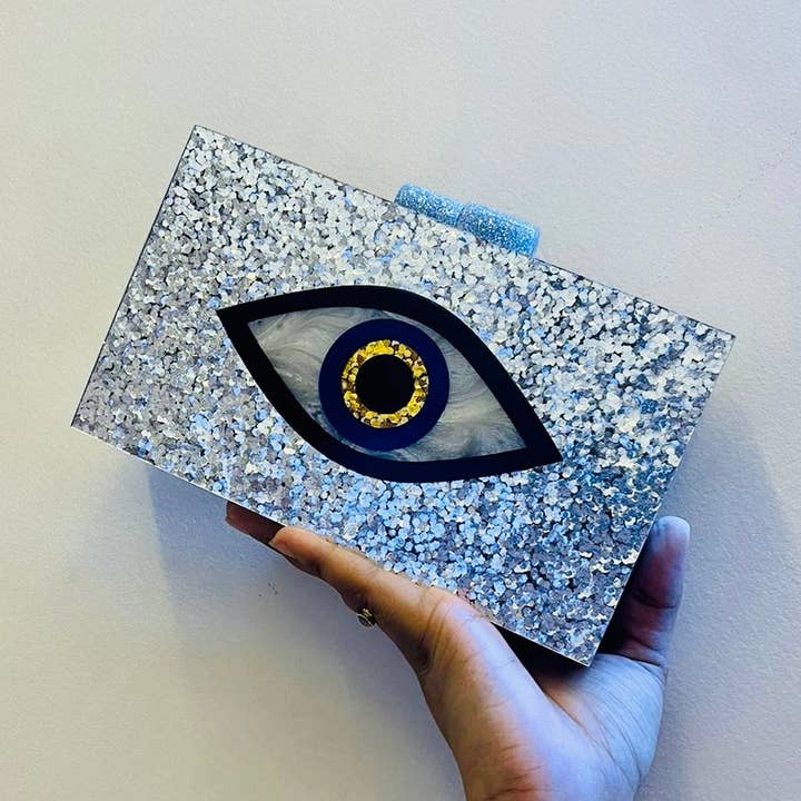 Silver Evil Eye Clutch for wholesale by Clutch It Handbags