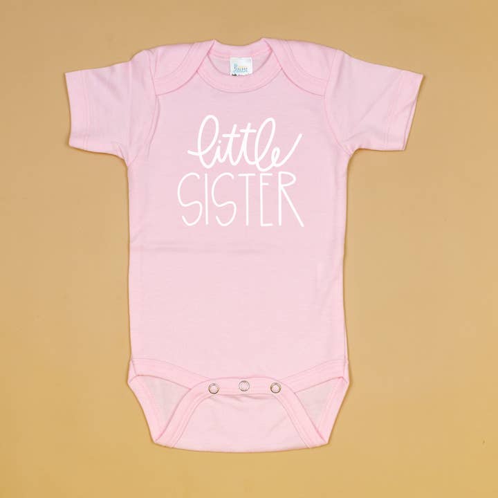 Little Sister | Pastel Pink Onesie for wholesale by Cuddle Sleep Dream