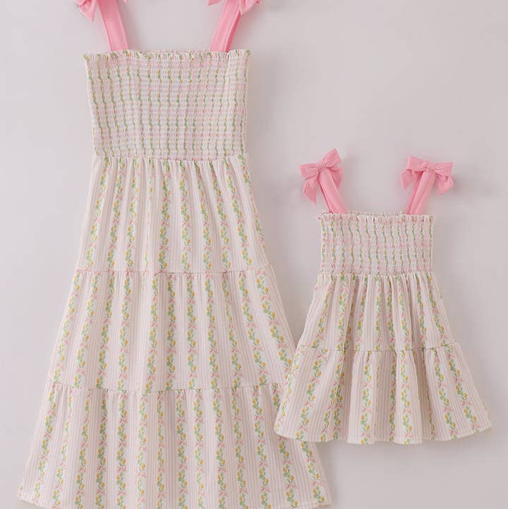 Pink lemon print bow smocked tiered mom&me dress for wholesale by Aspen Rain Boutique