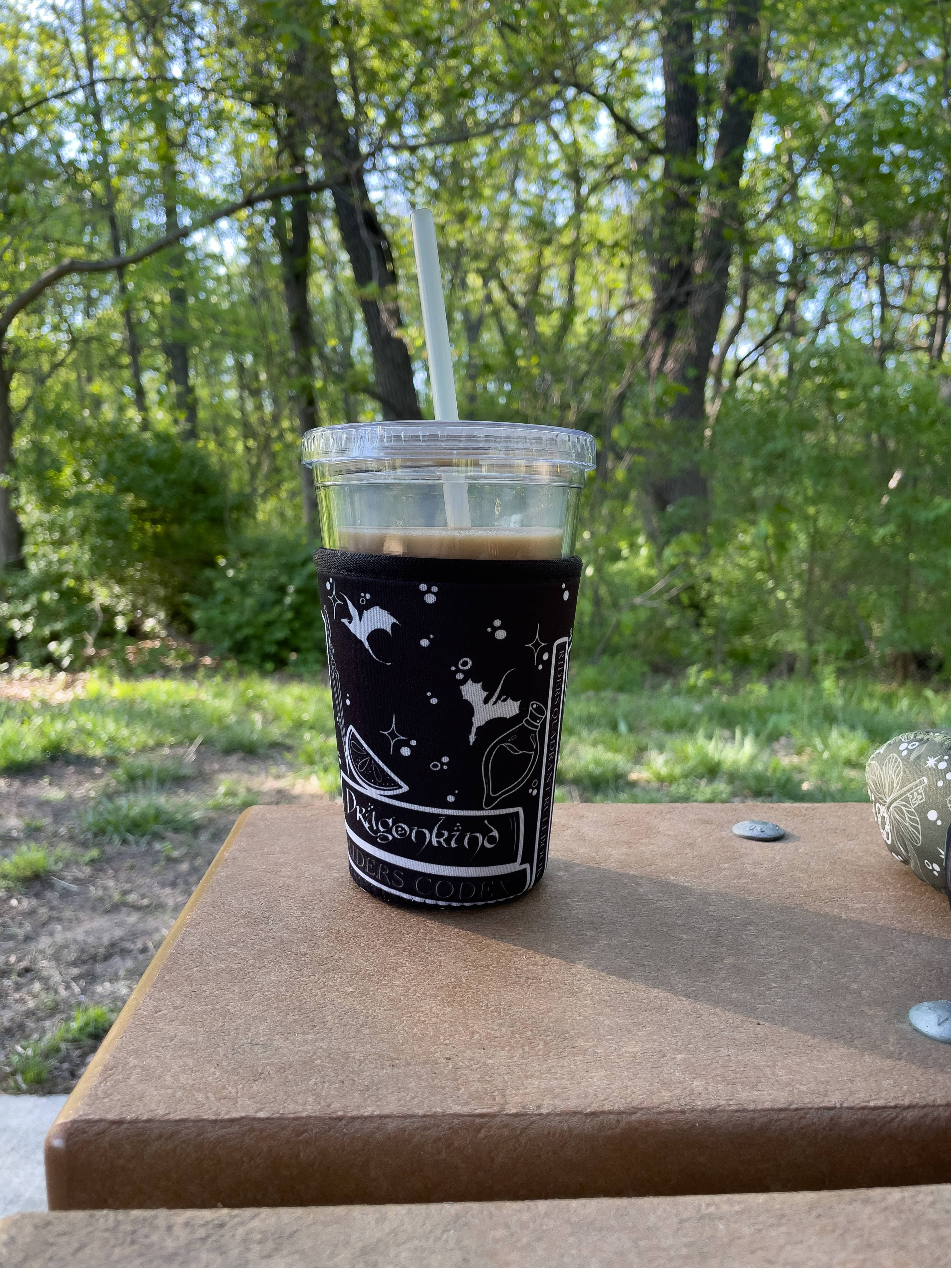 Meaggie Moos - Wholesale Drink Huggers & Koozies - 16oz Drink Sleeve | Fourth Wing Violet's Bookshelf3