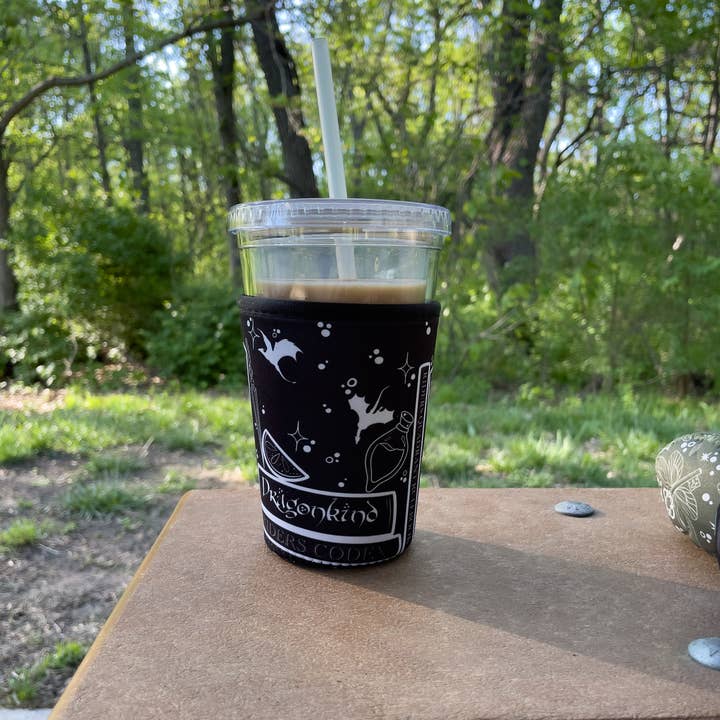 Meaggie Moos - Wholesale Drink Huggers & Koozies - 16oz Drink Sleeve | Fourth Wing Violet's Bookshelf3