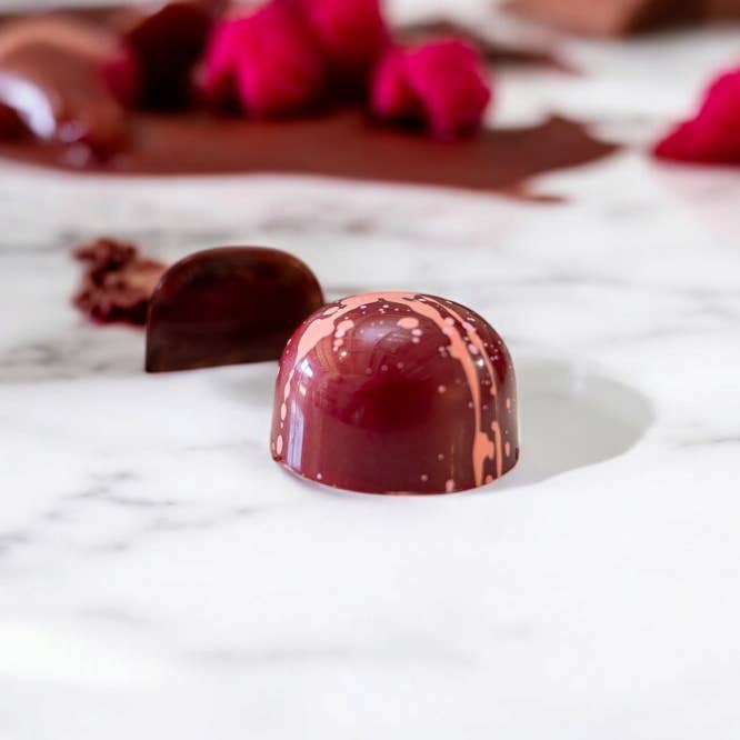 Mmm… Raspberry - Bulk BonBons 12 piece Tray for wholesale by J. Patrice Chocolate Studio