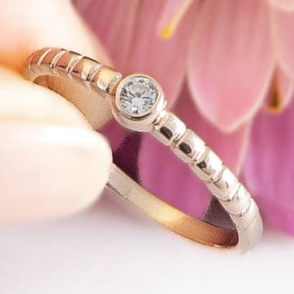 Textured Band with Small Zircon Accent in Rose Gold Plated Sterling Silver for wholesale by The Green Gecko