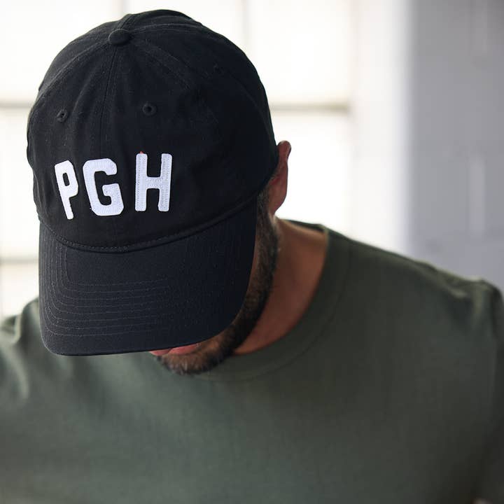 Black PGH Strapback Hat for wholesale on Faire