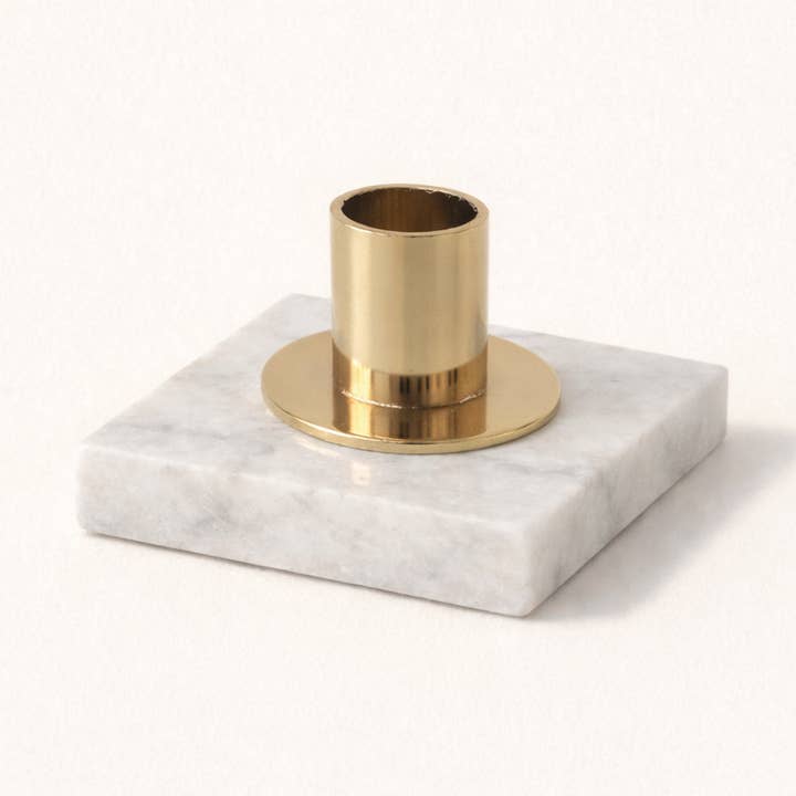EIRA Polished Gold Taper Candle Holder for wholesale by GLO & NEST